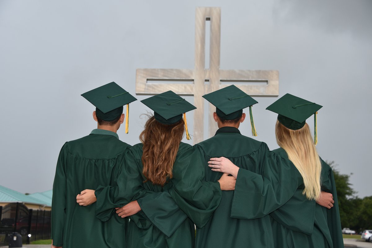 Graduates with cross